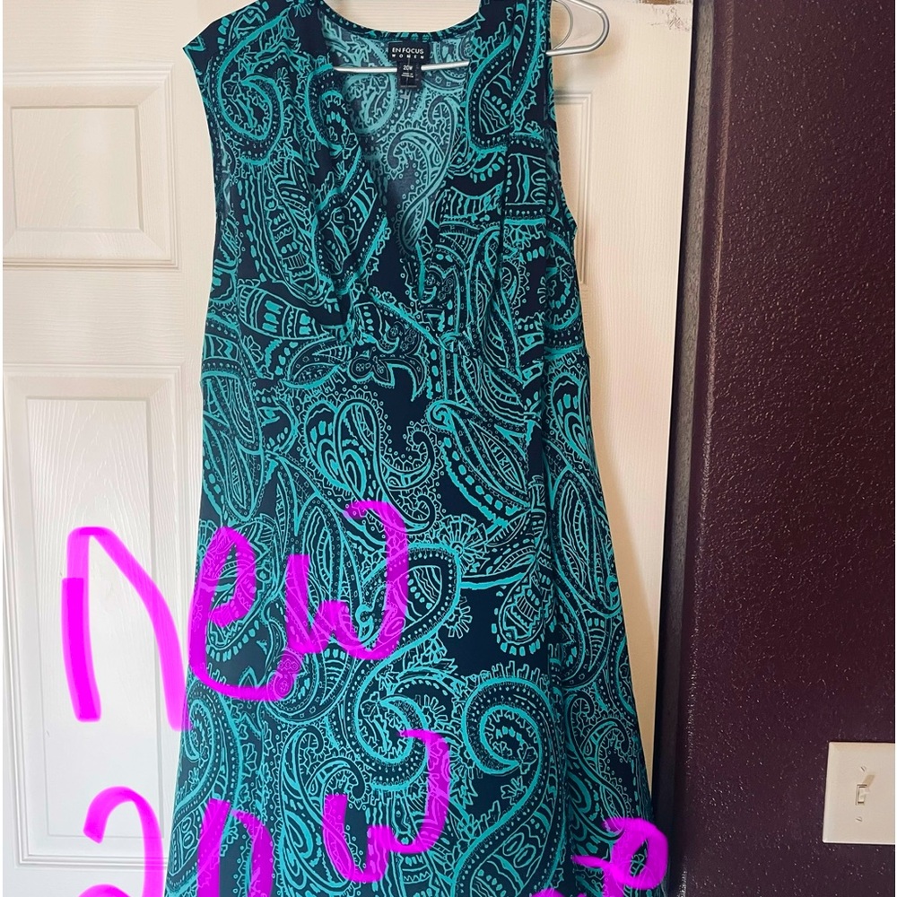 Very flattering low cut dress new with tags